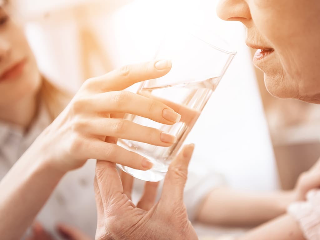 ALS patient drinking water