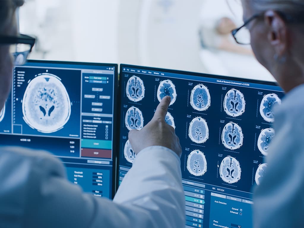 Doctors diagnosing neurodegenerative diseases