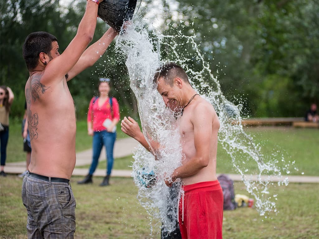 Two men taking part in the ALS Ice Bucket Challenge 