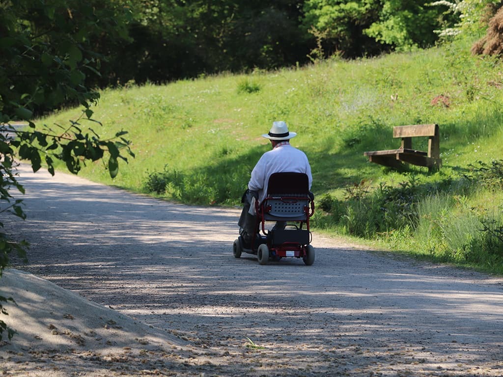 ALS patient using a mobility scooter