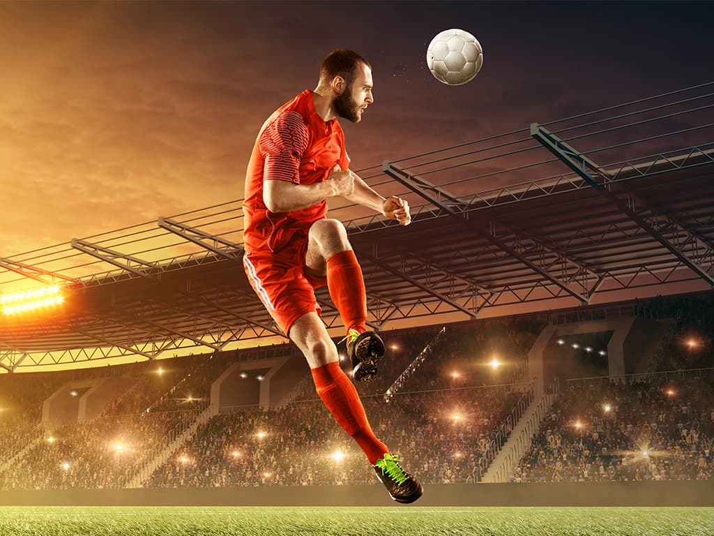 Soccer player heading the ball